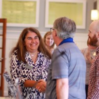 Johanna receiving her award from Greg